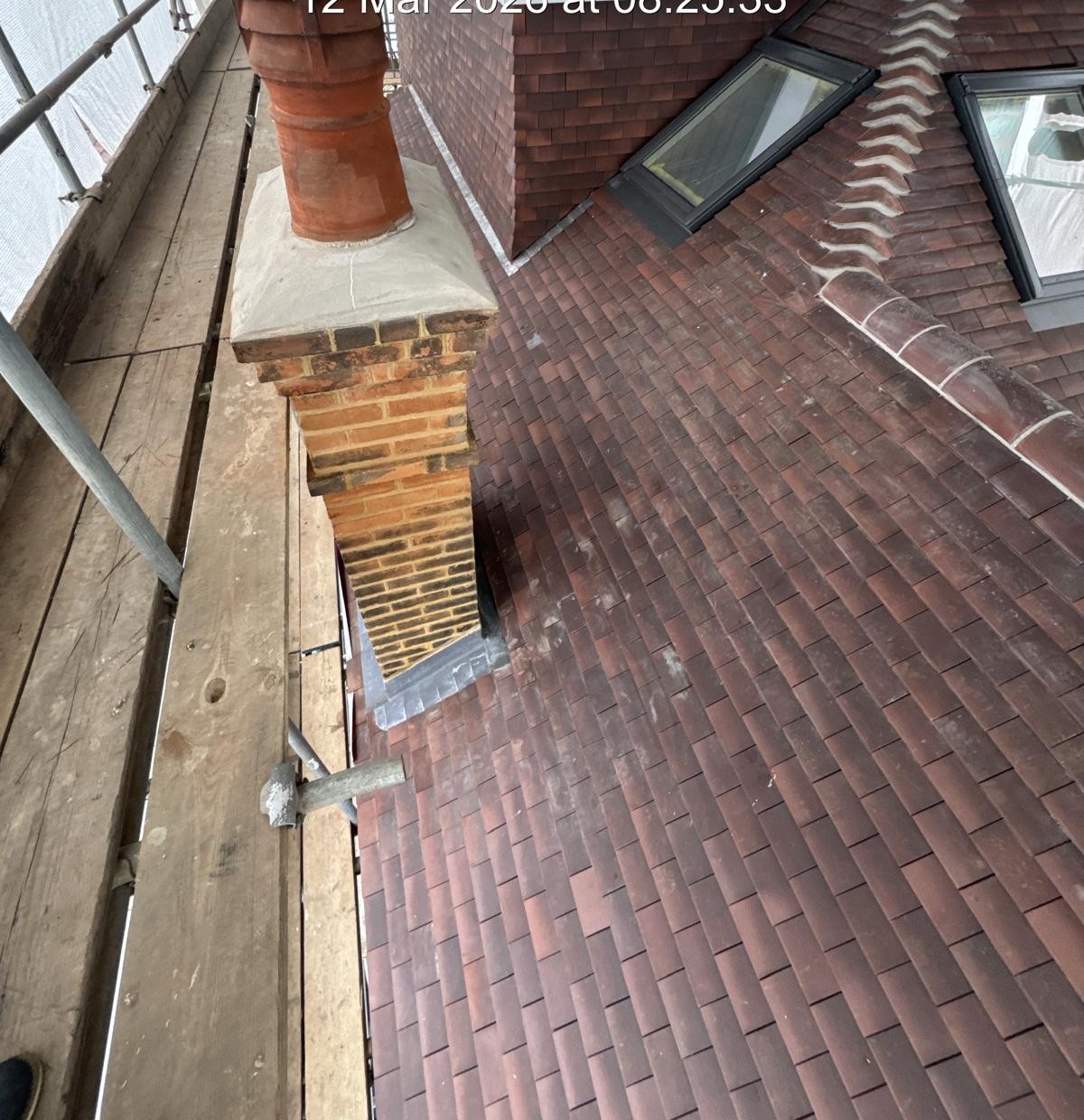 Residential roof and chimney detailing during construction